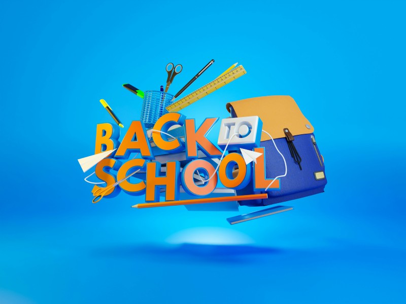 Об’ємна композиція з написом "Back to School" на синьому фоні з канцелярським приладдям — ножицями, лінійкою, ручками, олівцем та рюкзаком.